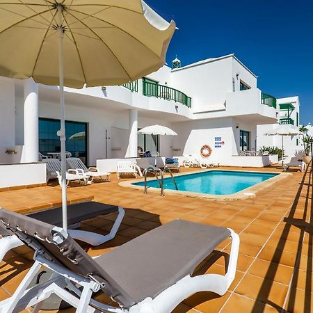 Apartamentos Los Quiqueres ปูแอร์โตเดลคาร์เมน ภายนอก รูปภาพ