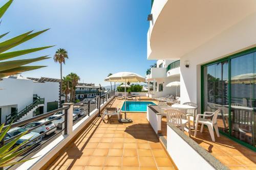 Apartamentos Los Quiqueres ปูแอร์โตเดลคาร์เมน ภายนอก รูปภาพ