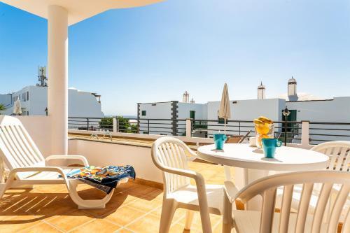 Apartamentos Los Quiqueres ปูแอร์โตเดลคาร์เมน ภายนอก รูปภาพ