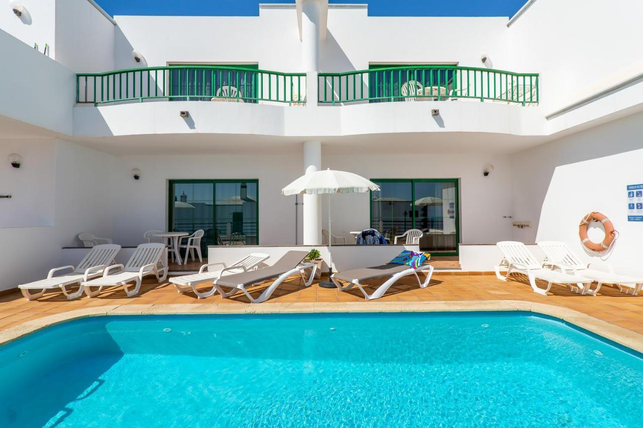 Apartamentos Los Quiqueres ปูแอร์โตเดลคาร์เมน ภายนอก รูปภาพ